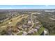 Property view from above showcasing neighborhood and golf course at 2957 Wilderness E Blvd, Parrish, FL 34219