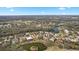 Property view from above showcasing neighborhood and golf course at 2957 Wilderness E Blvd, Parrish, FL 34219