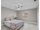 Guest bedroom with ceiling fan and window coverings at 2957 Wilderness E Blvd, Parrish, FL 34219