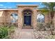 Brick entryway with a dark blue double door at 2957 Wilderness E Blvd, Parrish, FL 34219
