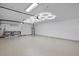 Garage with epoxy floor and unique hexagon lighting at 2957 Wilderness E Blvd, Parrish, FL 34219