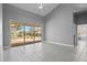 Gathering room with sliding doors leading to the patio at 2957 Wilderness E Blvd, Parrish, FL 34219