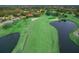 Beautiful golf course with water features and lush greenery at 2957 Wilderness E Blvd, Parrish, FL 34219