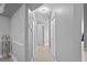 Clean and simple hallway with doors to bedrooms at 2957 Wilderness E Blvd, Parrish, FL 34219