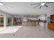 Open concept kitchen with breakfast bar and access to patio at 2957 Wilderness E Blvd, Parrish, FL 34219