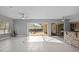 Living area with view of the backyard through sliding doors at 2957 Wilderness E Blvd, Parrish, FL 34219