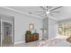 Main bedroom with ceiling fan and backyard access at 2957 Wilderness E Blvd, Parrish, FL 34219