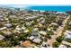 Aerial view of a charming house near the beach, showcasing its location and neighborhood at 307 Spring Ave, Anna Maria, FL 34216