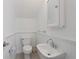 Clean and bright bathroom with updated fixtures at 307 Spring Ave, Anna Maria, FL 34216