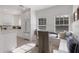 Bright kitchen nook with built-in seating and a window at 307 Spring Ave, Anna Maria, FL 34216
