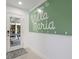 Bright entryway with a large 'Welcome to Villa Maria' sign at 307 Spring Ave, Anna Maria, FL 34216