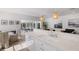Stylish kitchen with breakfast bar and ample counter space at 307 Spring Ave, Anna Maria, FL 34216