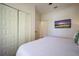 Spacious bedroom with ample closet space and TV at 312 61St St # B, Holmes Beach, FL 34217