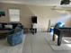 Fun game room with foosball table, arcade game, and seating at 312 61St St # B, Holmes Beach, FL 34217