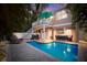 Inviting pool area with lounge chairs and outdoor seating at 312 61St St # B, Holmes Beach, FL 34217