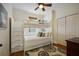 Charming bedroom featuring a cozy bunk bed with built-in storage and closet at 312 61St St # B, Holmes Beach, FL 34217