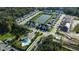 Community overview featuring lake, pool, and townhomes at 342 Via Anina Dr, Sarasota, FL 34243