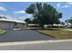 Charming single-story home with a well-maintained lawn and paved driveway at 430 Botticelli Dr # 430, Nokomis, FL 34275