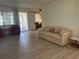 Bright and spacious living room with an inviting ambiance and modern flooring at 430 Botticelli Dr # 430, Nokomis, FL 34275