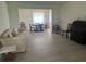 This inviting living room features a dining table and plenty of natural light at 430 Botticelli Dr # 430, Nokomis, FL 34275