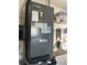 The utility area has a Lennox HVAC system, sink, washer, dryer, and shelving for storage at 430 Botticelli Dr # 430, Nokomis, FL 34275