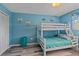 Bedroom with a bunk bed and light blue walls at 4460 Ironwood Cir # 403A, Bradenton, FL 34209