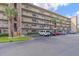 Building exterior showcasing ample parking and a well-maintained property at 4460 Ironwood Cir # 403A, Bradenton, FL 34209