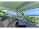 Balcony with comfortable seating offering beautiful beach and ocean views at 506 S Casey Key Rd, Nokomis, FL 34275