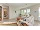 Inviting living room featuring comfortable seating, stylish decor, and an open layout at 506 S Casey Key Rd, Nokomis, FL 34275