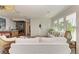 Bright living room featuring modern furniture, built-ins, and plenty of natural light at 506 S Casey Key Rd, Nokomis, FL 34275