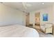 Bright main bedroom showcasing a bathroom at 506 S Casey Key Rd, Nokomis, FL 34275