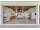 Open and spacious main bedroom features wood ceiling and ensuite bath access at 506 S Casey Key Rd, Nokomis, FL 34275