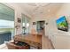 Bright office area offers views of the water and features a classic desk at 506 S Casey Key Rd, Nokomis, FL 34275