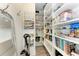 Walk-in pantry with abundant shelving and storage space at 506 S Casey Key Rd, Nokomis, FL 34275