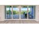 Covered patio with ocean views, outdoor dining, and tile flooring at 506 S Casey Key Rd, Nokomis, FL 34275