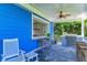 Outdoor patio features a built-in bar with pass-through window to kitchen at 506 S Casey Key Rd, Nokomis, FL 34275