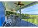 Covered patio with ocean views and grill at 506 S Casey Key Rd, Nokomis, FL 34275