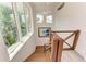 Staircase featuring natural light and a painting at 506 S Casey Key Rd, Nokomis, FL 34275