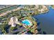 Aerial view of community pool and tennis courts at 5759 Benevento Dr, Sarasota, FL 34238