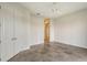 Bedroom with double doors and mirrored closet at 5759 Benevento Dr, Sarasota, FL 34238