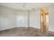 Spacious bedroom with double doors and mirrored closet at 5759 Benevento Dr, Sarasota, FL 34238