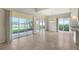 Bright dining room with tile floor and sliding glass doors at 5759 Benevento Dr, Sarasota, FL 34238