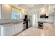 Modern kitchen with stainless steel appliances and granite counters at 5759 Benevento Dr, Sarasota, FL 34238