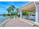 Community lakeside pavilion with seating at 5759 Benevento Dr, Sarasota, FL 34238