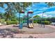 Community playground with slides and play area at 5759 Benevento Dr, Sarasota, FL 34238