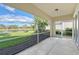 Spacious screened patio overlooking a lake at 5759 Benevento Dr, Sarasota, FL 34238