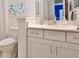 Bright bathroom with white cabinets and a modern vanity at 7016 Playa Bella Dr, Bradenton, FL 34209