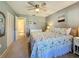 Primary bedroom with king-size bed and access to bathroom at 707 Sorrento Inlt # 707, Nokomis, FL 34275