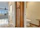Small half bathroom with toilet and storage cabinet at 741 Fairway Ridge Ct, Sun City Center, FL 33573