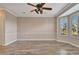 Spacious bedroom with hardwood floors and ceiling fan at 741 Fairway Ridge Ct, Sun City Center, FL 33573